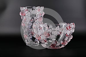 Vase from transparent glass in srozovy flowers