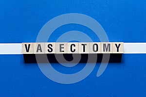 Vasectomy word concept on cubes