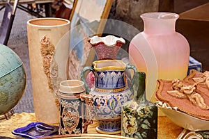 Vases and art objects on sale at street market, Chiavari, Italy