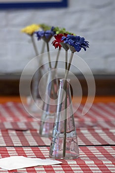 Vases with artificial flowers