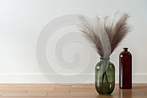 Vases with decorative feathers  close-up