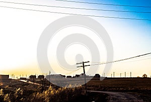 Vast expanses of the vast country. road. overhead transmission line. spring the sky, the beginning of heyday of nature. farmhouses photo