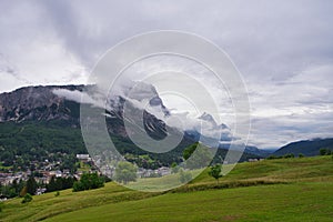 Vast landscape and the Dolomite Mountains in Italy on a cloudy day