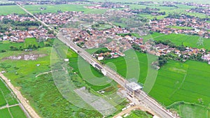 Vast meadow flanking the highway - stock photo