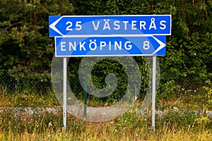 Vasteras and Enkoping signpost