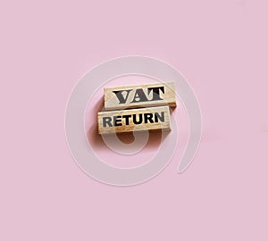 VAT return text Value Added Tax return on wooden blocks. Financial concept