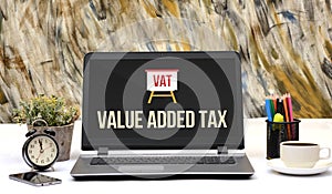 VAT Value Added Tax sign on laptop screen