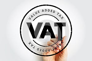 VAT Value Added Tax - type of tax that is assessed incrementally, acronym text stamp