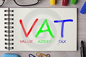 VAT written on notebook photo