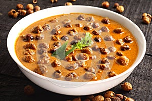 Vatha kulambu served in bowl,