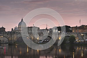 Vatican City, Rome, Italy, Beautiful Vibrant Night image Panorama of St. Peter`s Basilica, Ponte St. Angelo and Tiber River at Dus