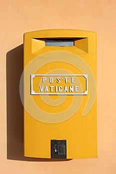 Yellow mailbox in the Vatican City, the symbol of papal mail