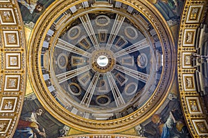 Ornate interior and a dome of Saint Peter's Basilica in Vatican