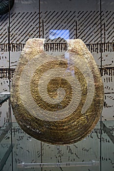 Ancient Etruscan golden breastplate decoration on display of the Museums of Vatican