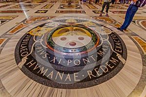 VATICAN, ITALY - JUNE 13, 2015: Vatican seal on the floor at the entrance of Saint Peter Basilica