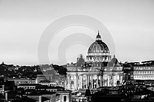 Black and white night view of St. Peter's Basilica in Vatican City, Rome, Italy