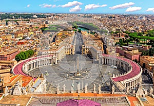 Vatican skyline view and statues on the top of St Peter's Basilica, Rome, Italy