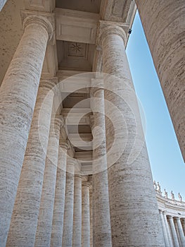 Vatican State, Italy - 21 March 2022: Details of the colonnade in St. Peter's Square in the Vatican state