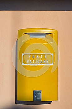 VATICAN, VATICAN CITY STATE - January 7, 2017: Yellow mailbox in Vatican City