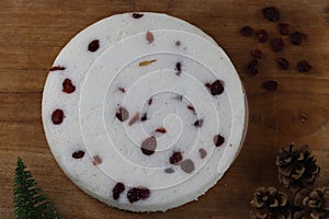 Vattayappam. Steamed spongy rice cake topped with dried cranberries