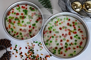 Vattayappam with tutti fruity, a Kerala sweet dish. Vattayappam is a steamed rice cake with coconut and yeast