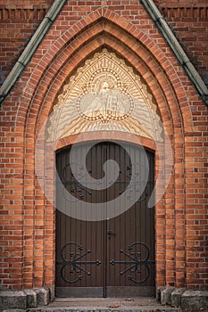 Vaulted entrance door to an old Swedish brick church