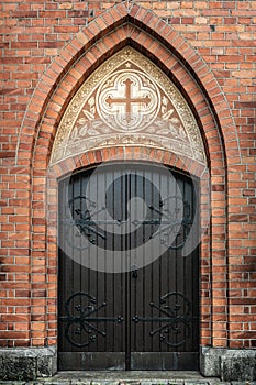 Vaulted and ornamented entrance door to an old Swedish church