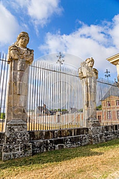 Vaux-le-Vicomte, France. The fence of the estate with sculpted figures