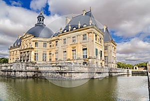 Vaux-le-Vicomte, France. View of the central building of the estate, surrounded by an artificial channel photo