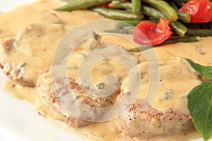 Veal in a creamy sauce closeup