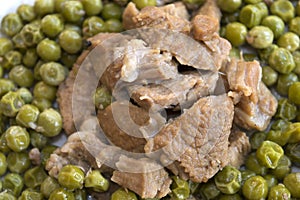 Veal stew with peas