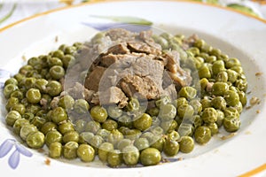 Veal stew with peas