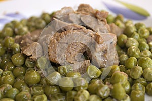 Veal stew with peas