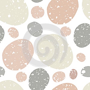 Vector abstract grunge textured pebble seamless pattern background. Monochrome pink and brown flecked stone oval circles