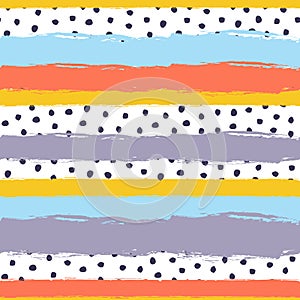 Vector abstract hand drawn seamless pattern with striped geometric brush painted elements and polka dots. Textured background