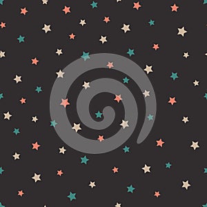 Vector abstract starry seamless pattern on the gray background.