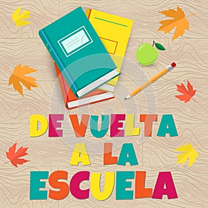 Vector Back to School poster in Spanish language on wood texture photo