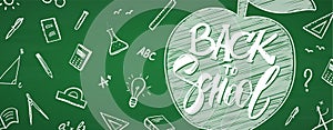 Vector banner with hand drawn lettering of Back to School, apple and doodles supplies on chalkboard background.