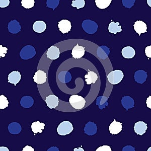 Vector blue monochrome paint blob polka dot repeat pattern. Suitable for textile, wallpaper and giftwrap.