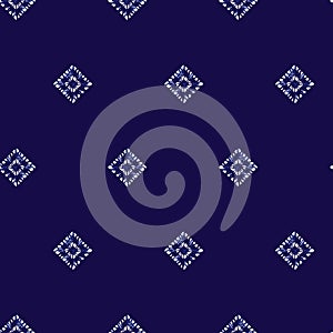 Vector blue shibori simple diamond square polka dot seamless pattern. Suitable for textile, gift wrap and wallpaper.