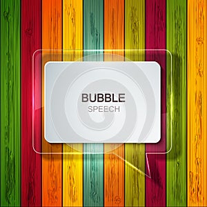 Vector bubble speech icon on wooden background.