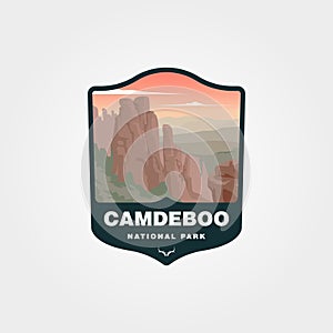 vector of Camdeboo National Park scenery adorns a dark teal badge photo