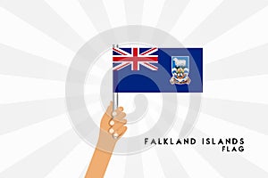 Vector cartoon illustration of human hands hold Falkland Islands flag
