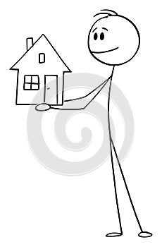 Vector Cartoon Illustration of Smiling Man or Businessman Holding Small Family House