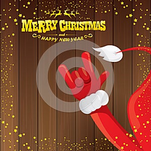 Vector cartoon Santa Claus rock n roll style with golden calligraphic greeting text on wooden background with christmas