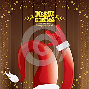 Vector cartoon Santa Claus rock n roll style with golden calligraphic greeting text on wooden background with christmas