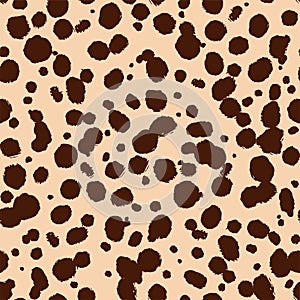 Vector cheetah skin seamless pattern. Trendy wild animal leopard spots, hand drawn natural brown texture for fashion