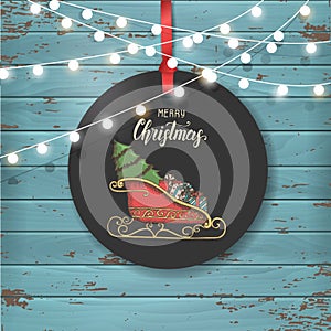 Vector Christmas vintage label with hand drawn Santa`s sleigh with presents and christmas tree. Hand made quote