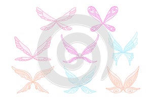 Vector collection of pink, blue and purple fairy s magic wings. Decorative elements for children s book, postcard, print