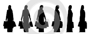 Vector concept conceptual black silhouette of a religious woman holding shopping bags from different perspectives